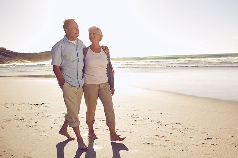 Couple walking on the beach